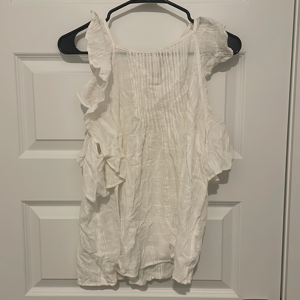 White ruffled tank